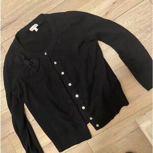 Black sweater with accent bow elegant and classic style Madison Jules